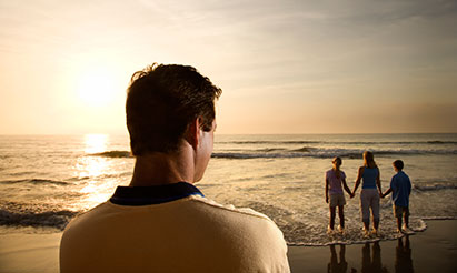 Man watching new wife and step-children